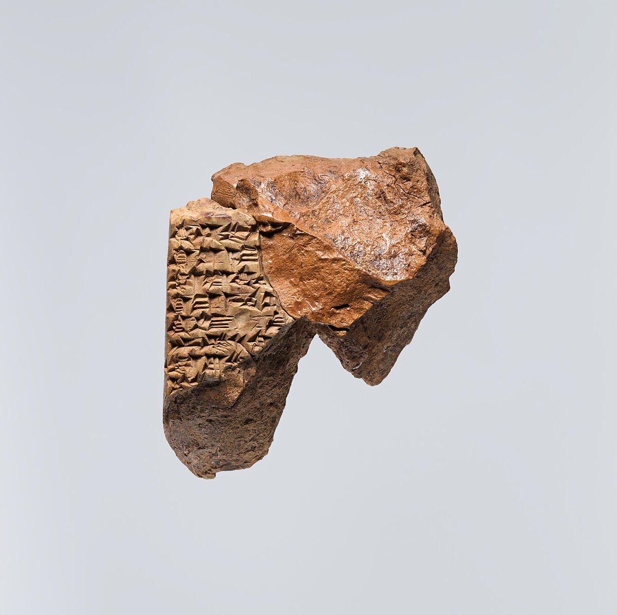 A fragment of the Atra-hasis flood narrative on an inscribed clay tablet.