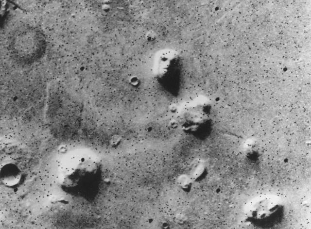 The Viking image shows the low-resolution face-like Cydonia formation that became the center of an artificial-monument controversy.